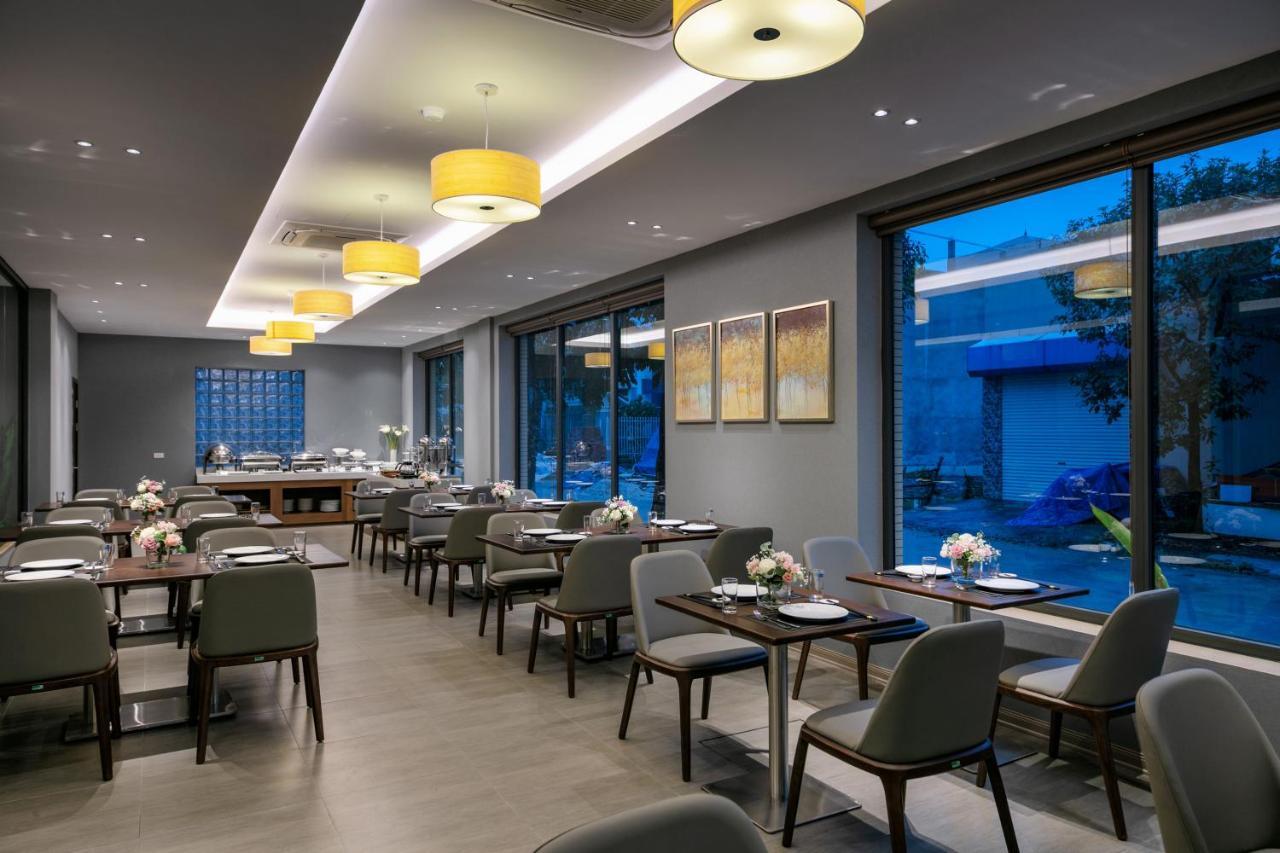 נין בין Golden Season Hotel מראה חיצוני תמונה